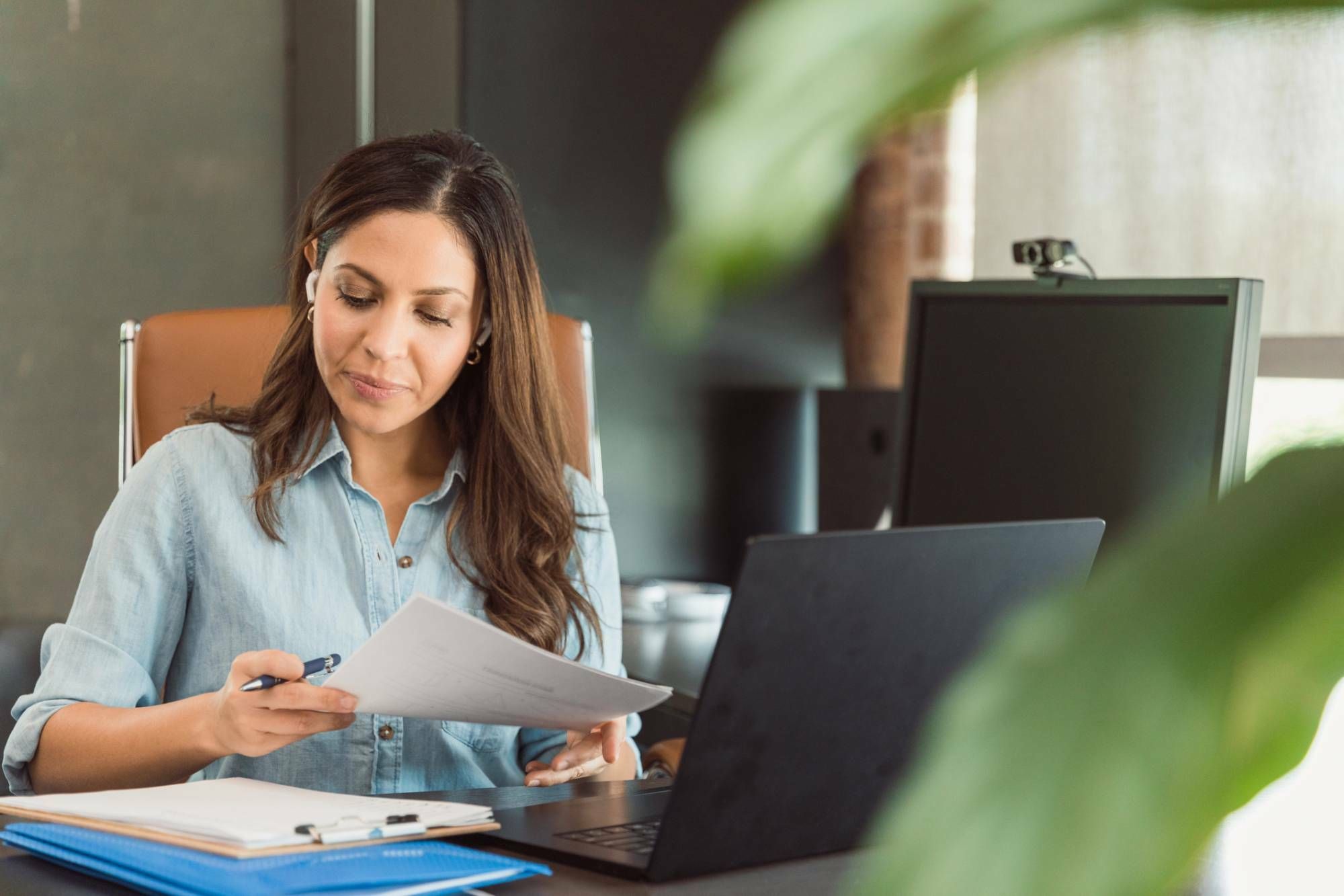 Title underwriter reviewing documents