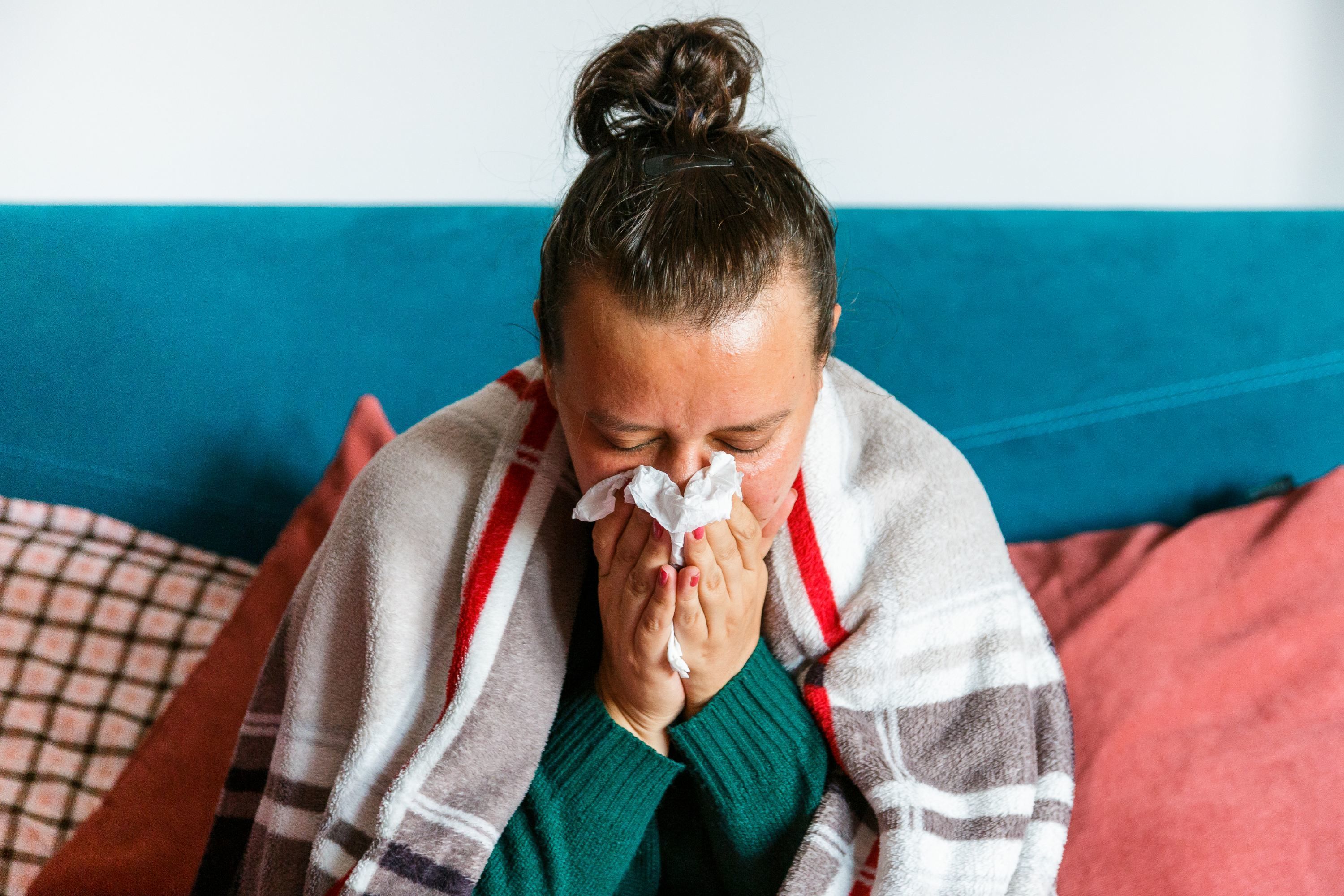 Woman with cold or flu symptoms