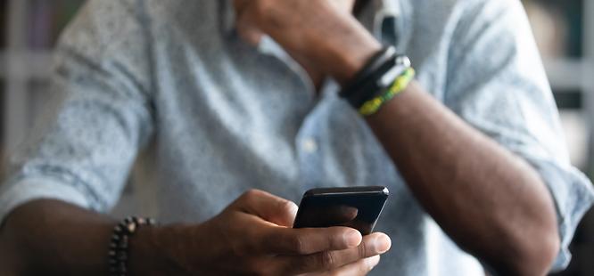 Person reading the news on phone