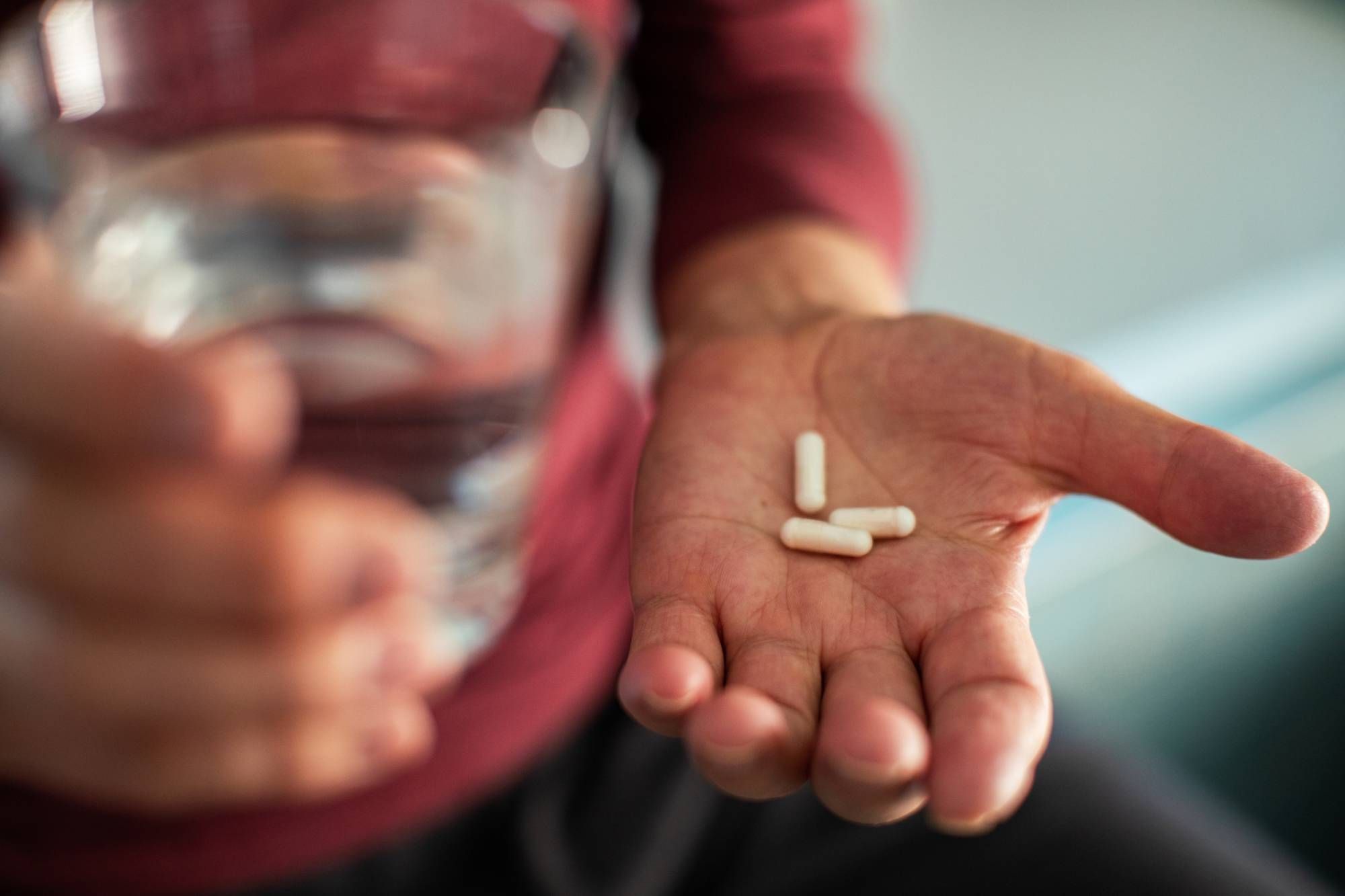 Man holding prescription medicine