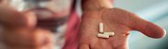 Man holding prescription medicine