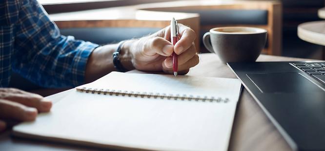 Man preparing medical history for primary care doctor