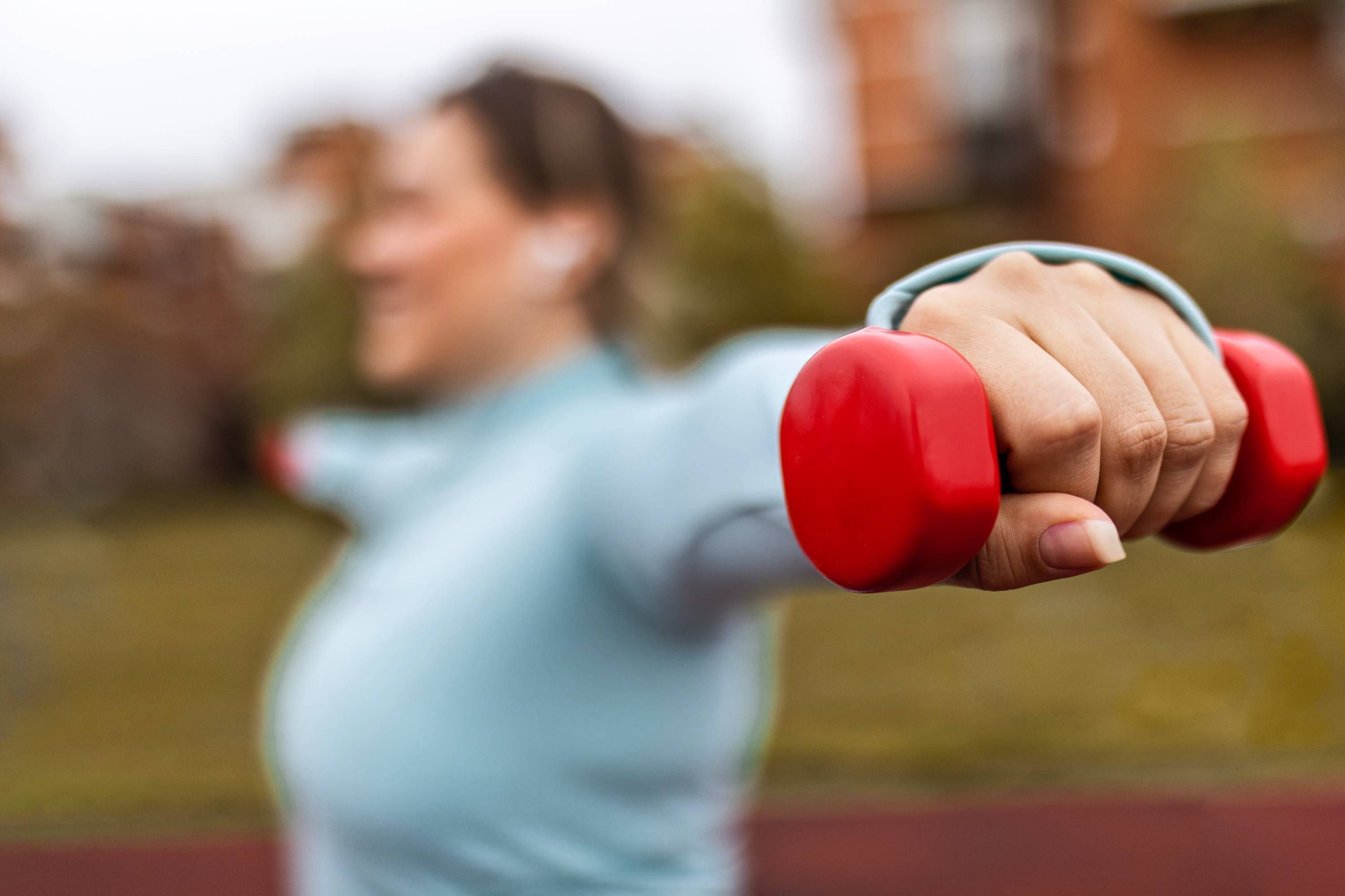 Woman exercising after talking to primary care doctor