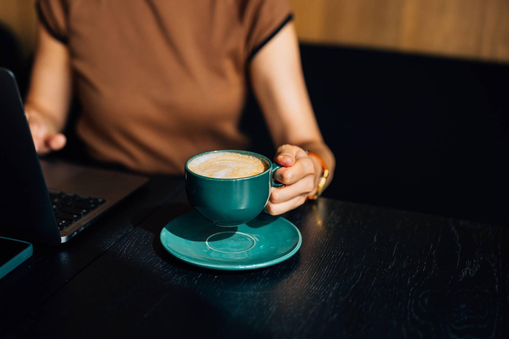 Woman safely consuming caffeine