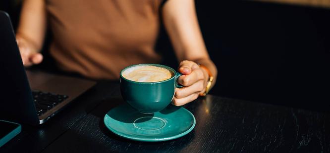 Woman safely consuming caffeine