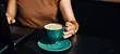Woman safely consuming caffeine