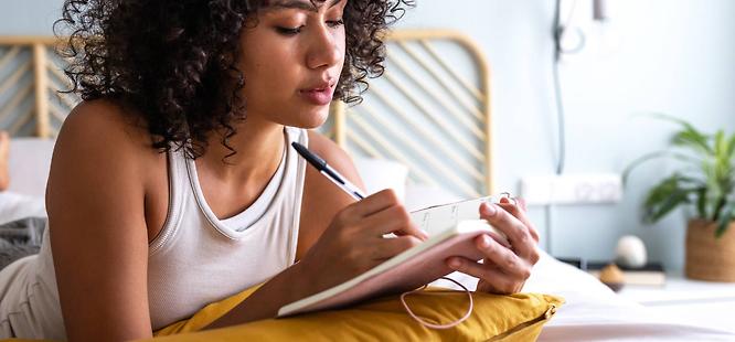 Woman tracking her health symptoms