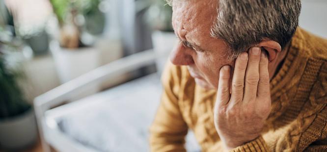 Adult man with an ear infection