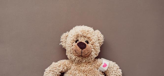 Teddy bear after getting a pretend injection