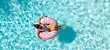 Woman floating in the pool in alabama