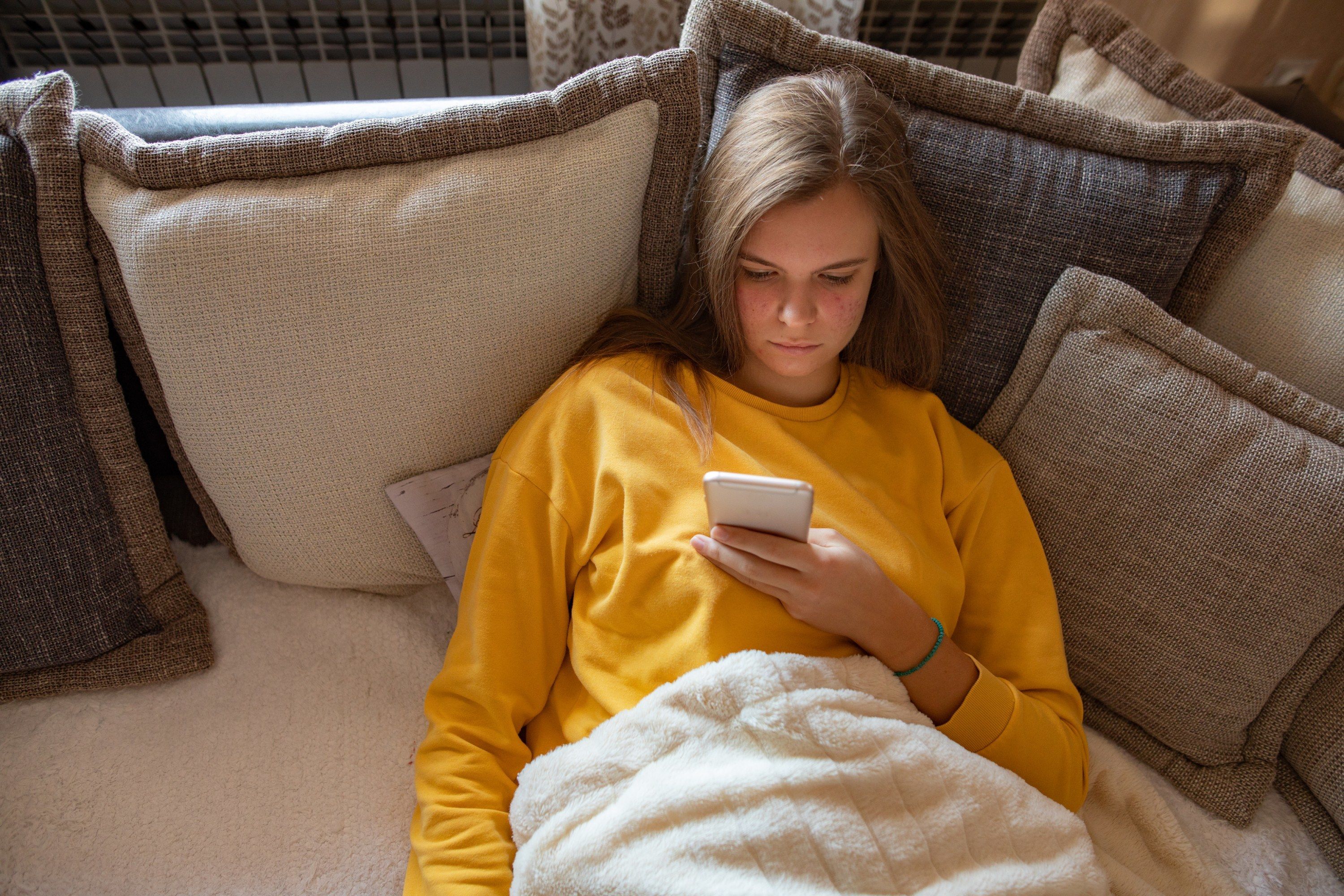 Woman sick with the flu in 2022