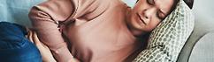 Woman with stomach discomfort