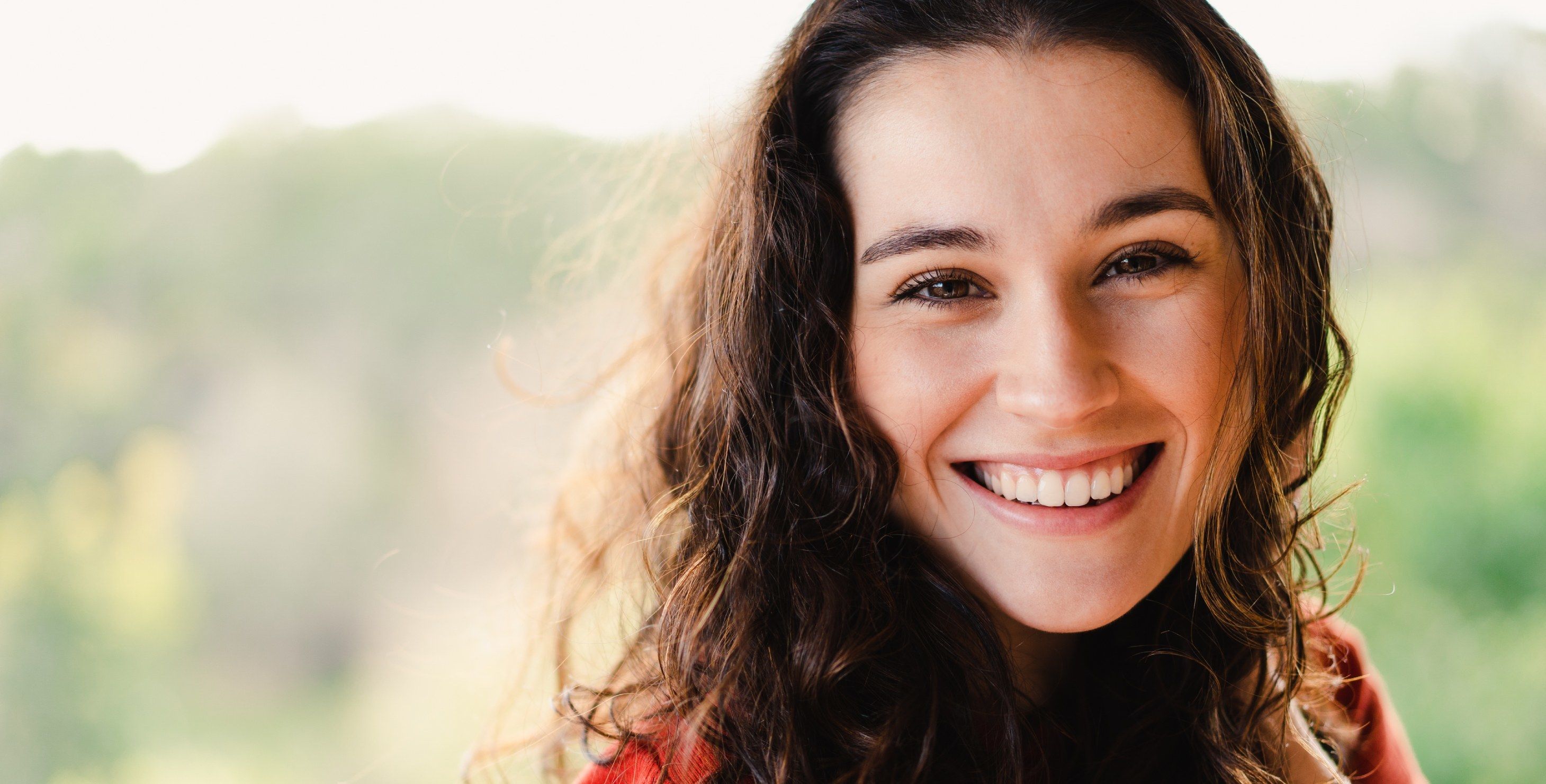 Smiling woman ready for mammogram