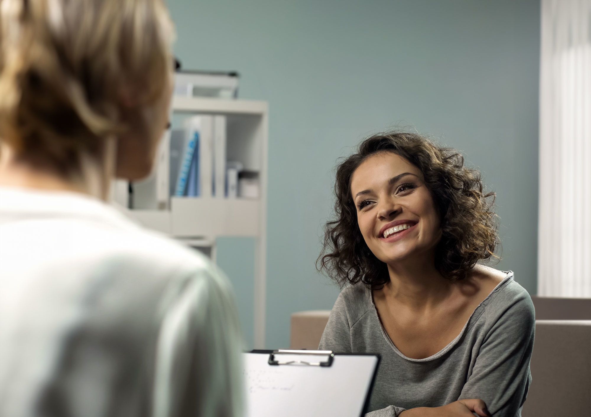 wellness therapy patient discussing eboo and ebo2