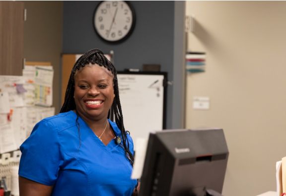 Smiling primary care nurse medhelp