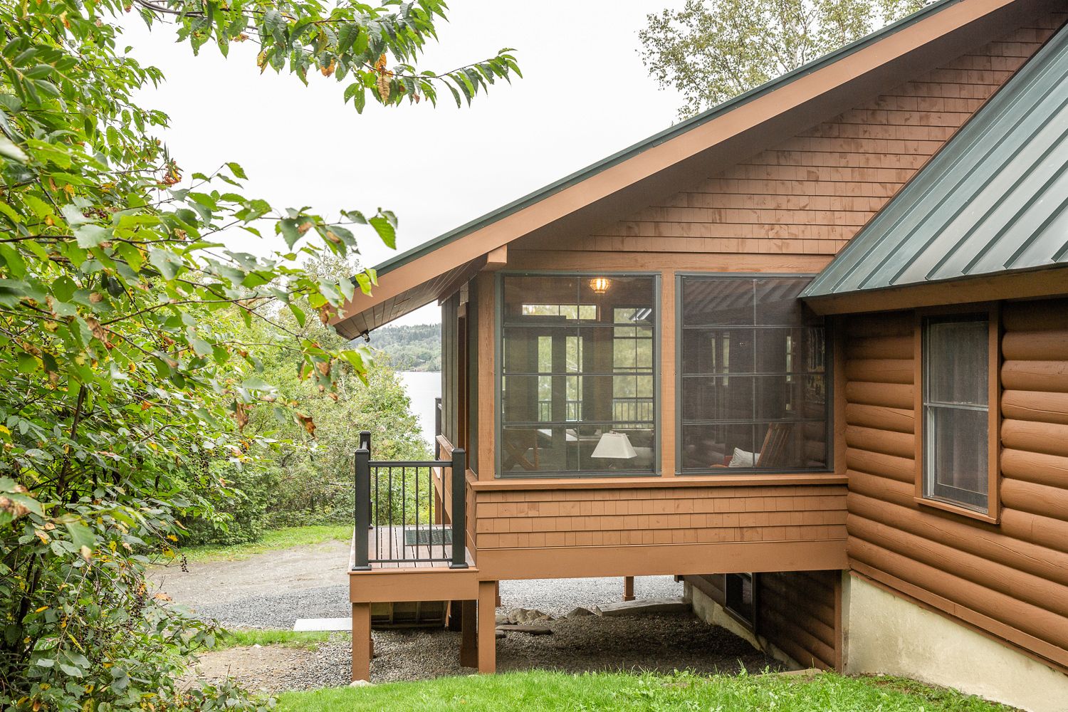 Three-season porch addition to an existing lakehouse