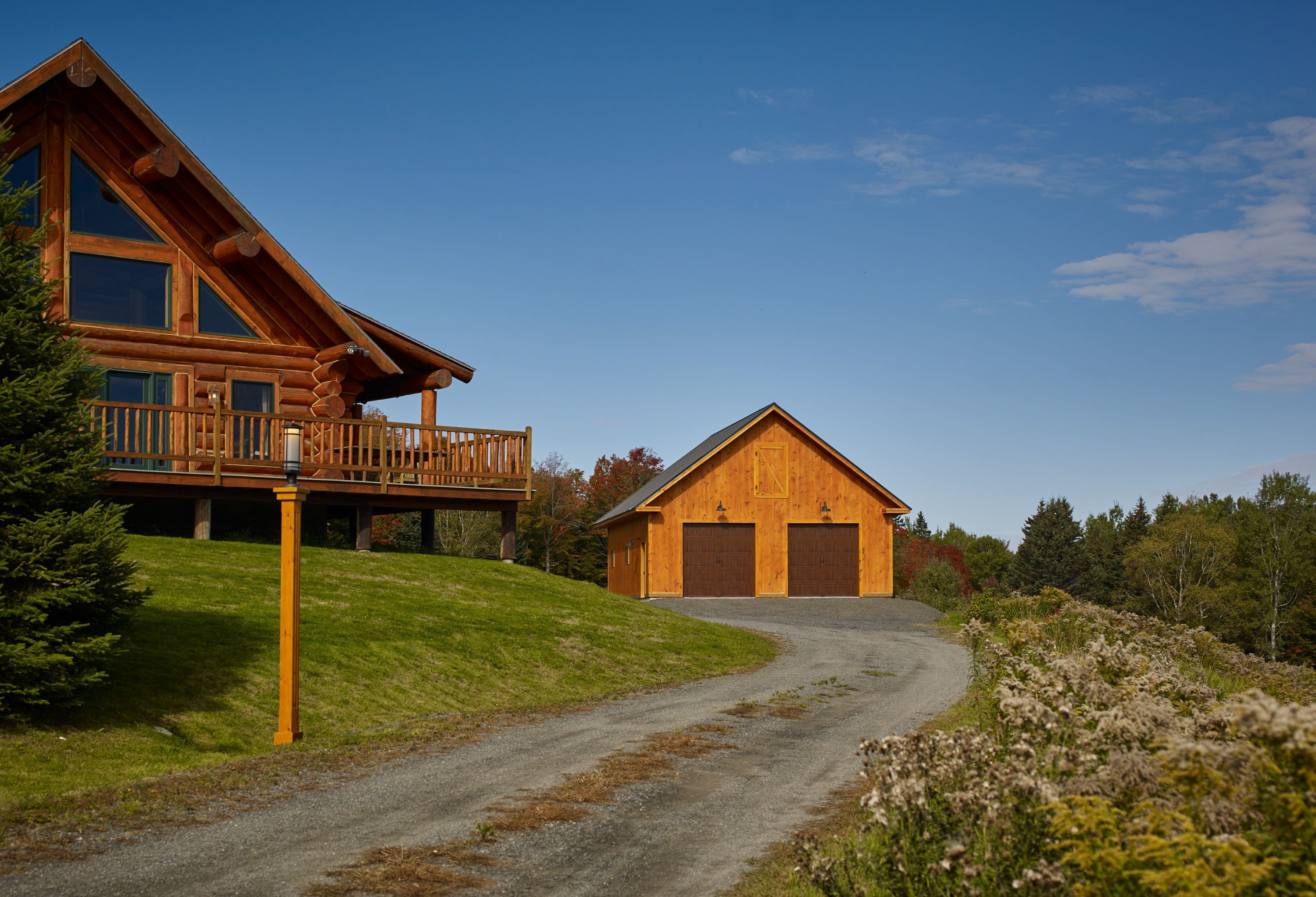 Garage and toy barn for recreational vehicle storage
