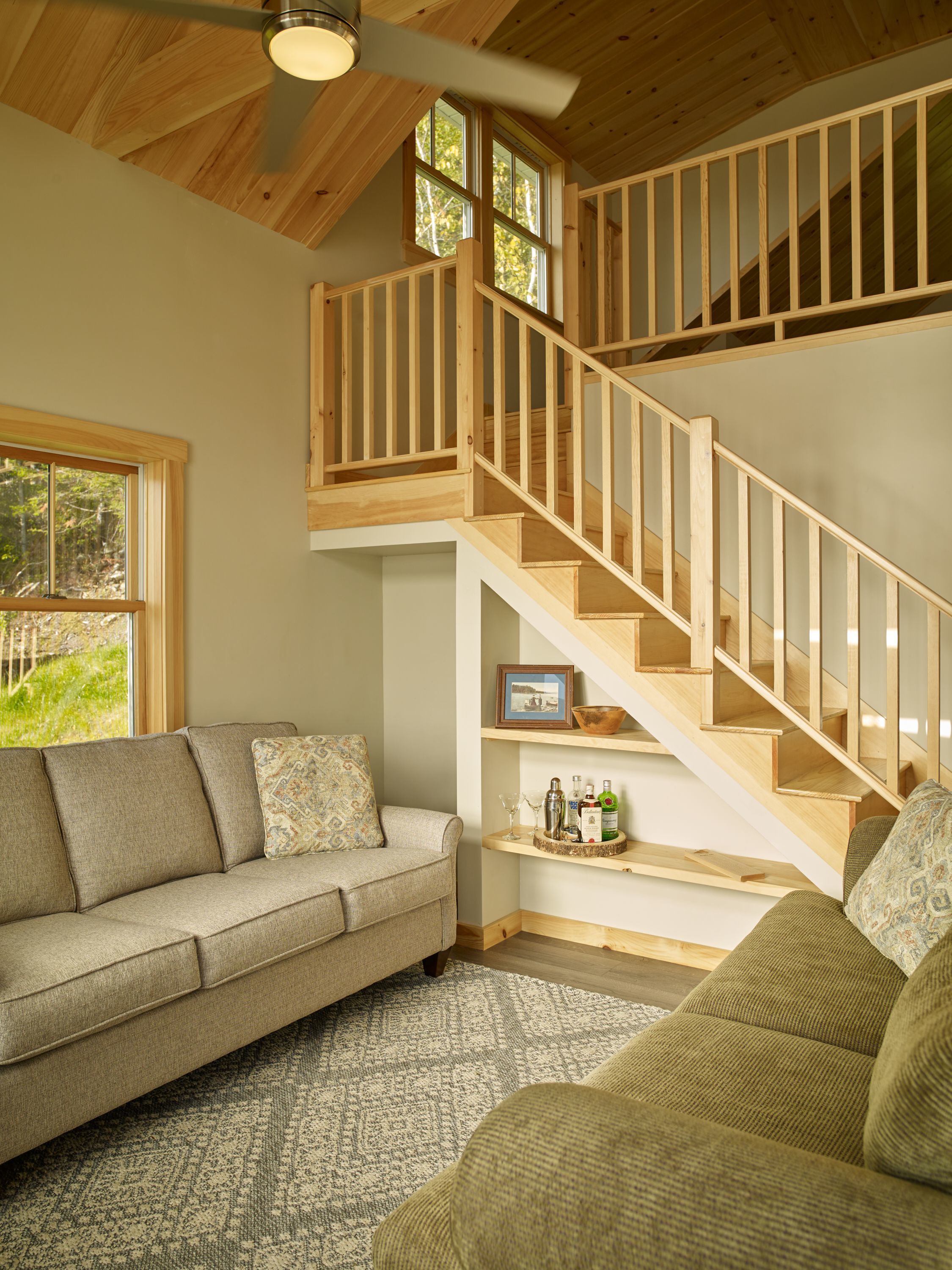 Built-in under-stair storage at Salmon Ledge Cottage