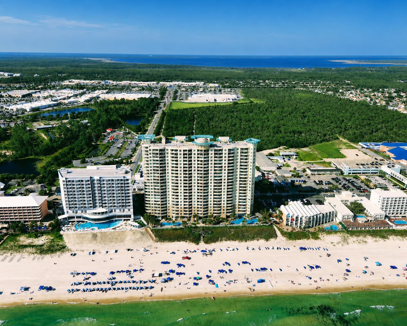 Aerial beachfront view of Aqua Condominiums in Panama City Beach.