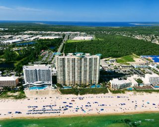Aerial beachfront view of Aqua Condominiums in Panama City Beach.