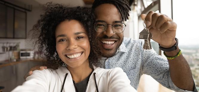 Happy couple after closing on a new home