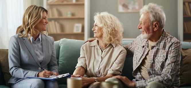 Mature couple discussing relationship changes and their real estate transaction
