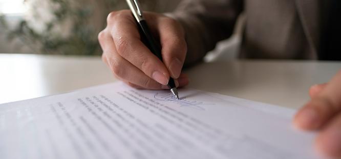 Person signing papers