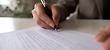 Person signing papers