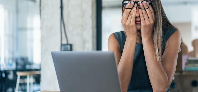 Person stressed because of real estate wire fraud