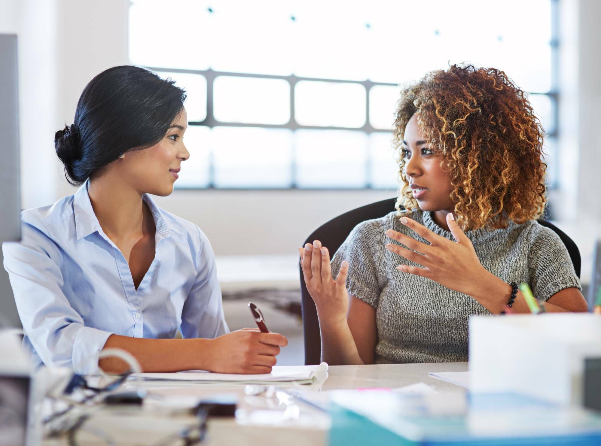 Real estate agent working with her title company on a difficult closing