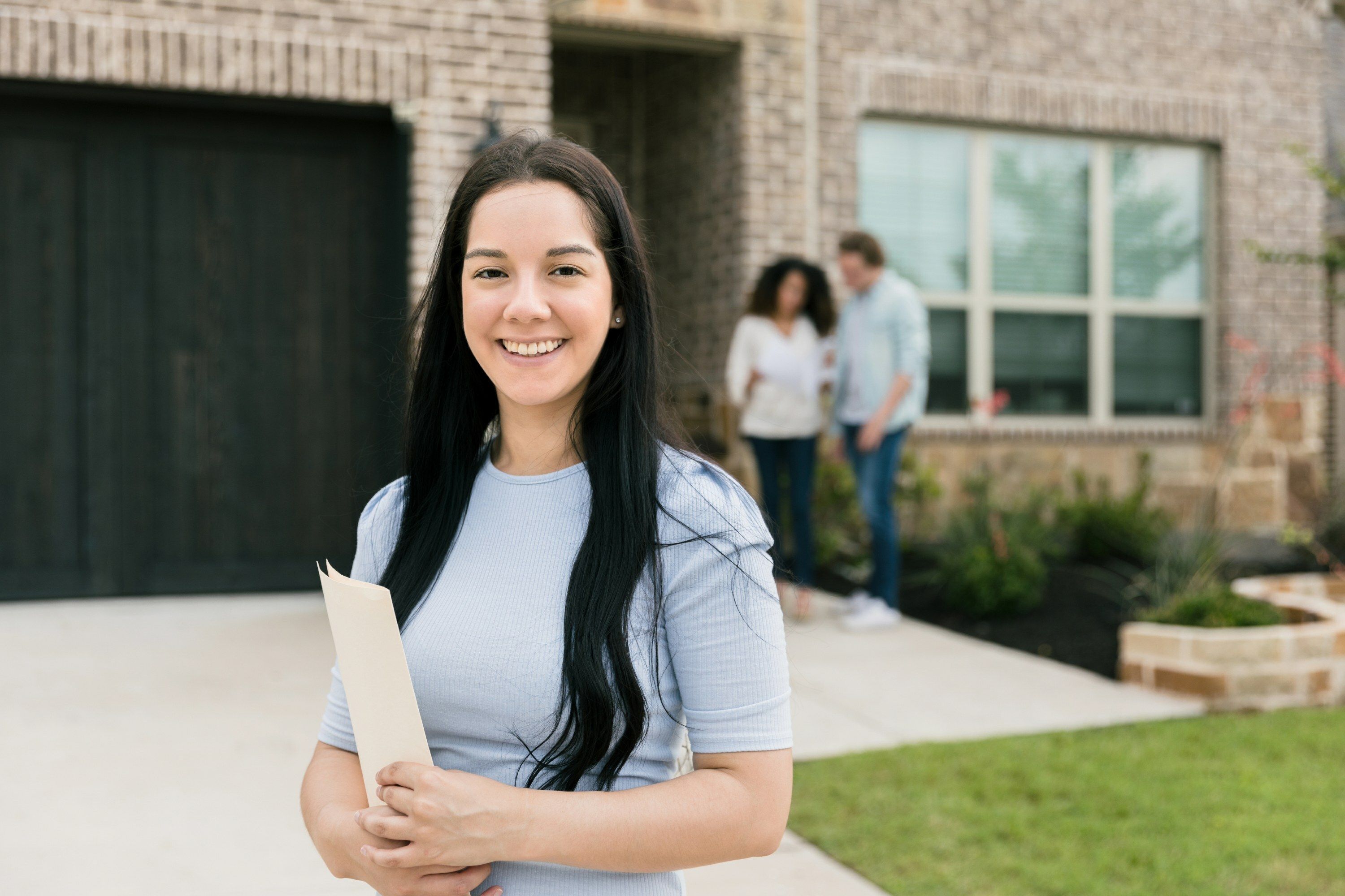 Realtor with happy clients