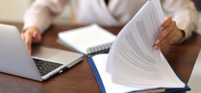 Woman conducting a title search at south oak