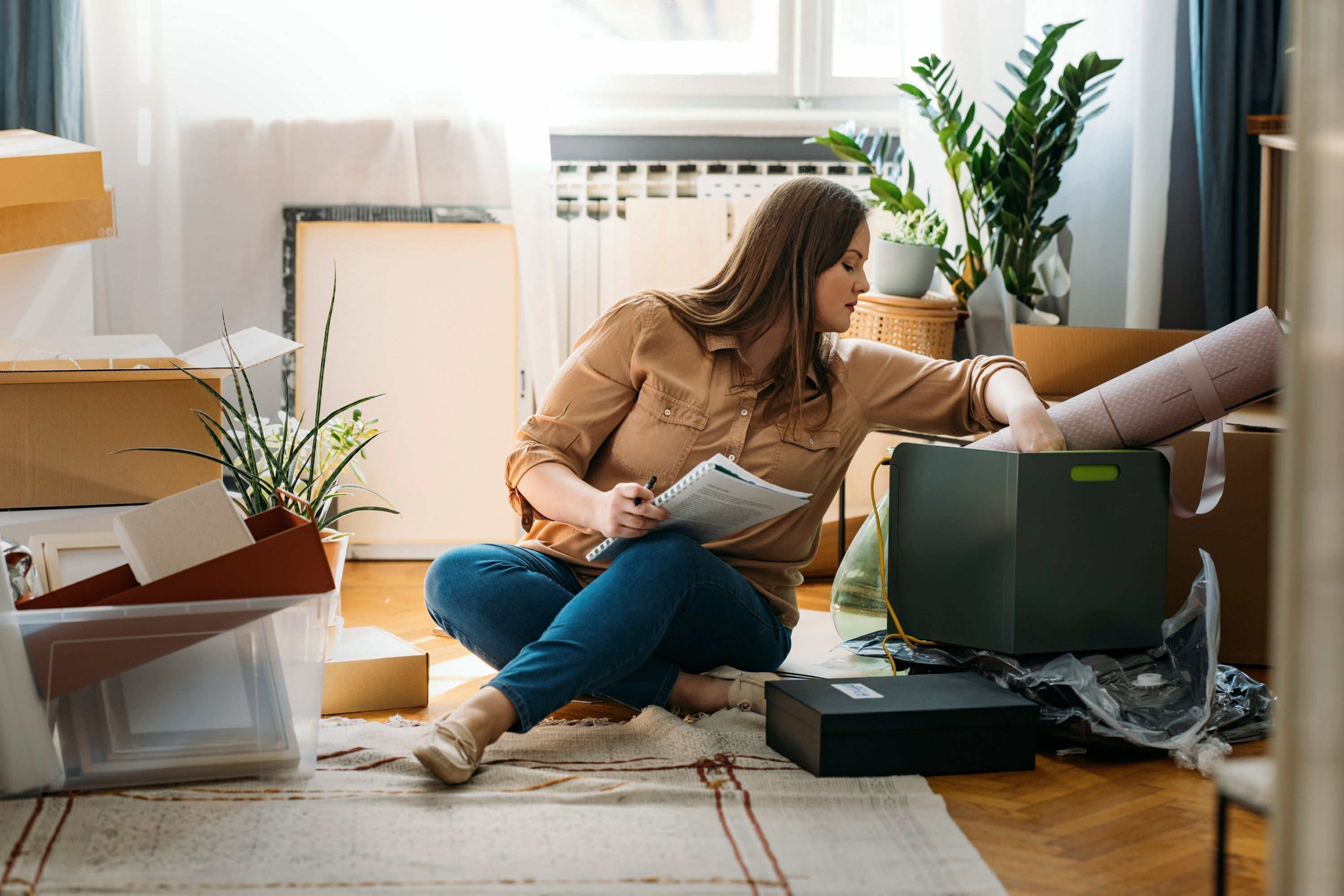 Woman packing who is vulnerable to wire fraud