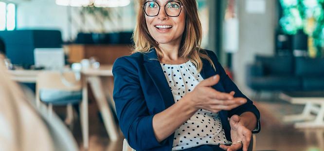 Woman talking about title insurance with clients