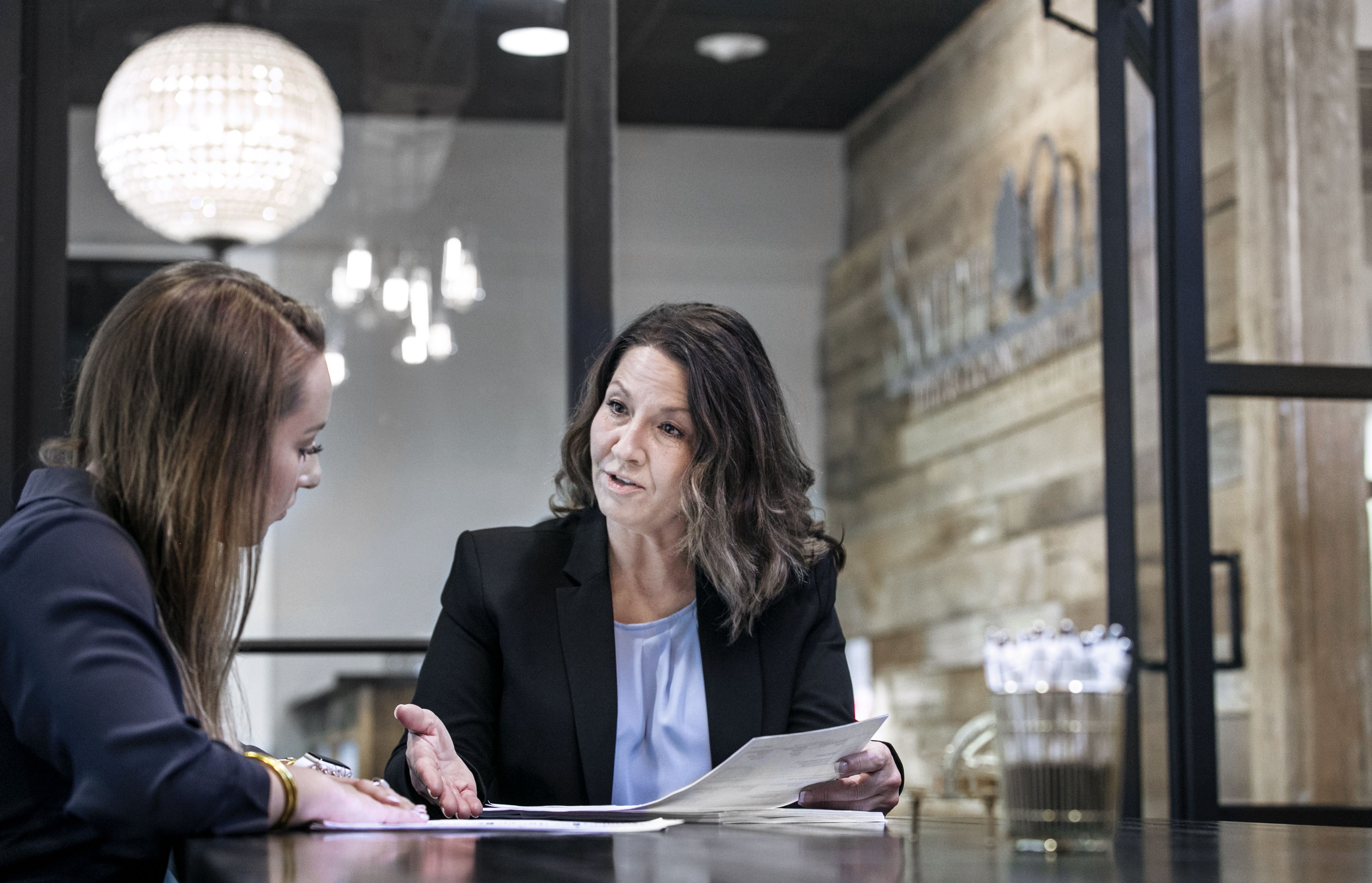 Two women closing at south oak title and closing