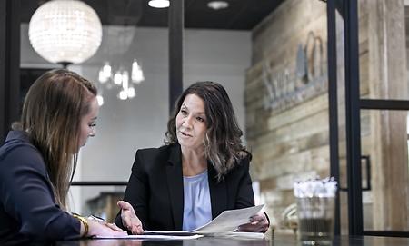 Two women closing at south oak title and closing